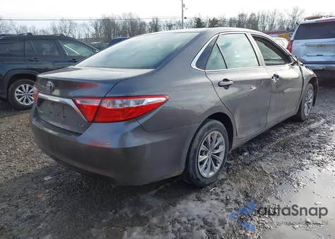 2016 Toyota Camry Le z USA, uszkodzony, nr VIN 4T4BF1FK1GR523053